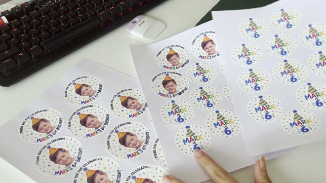 Printed sheets of custom Mark is 6 birthday stickers and photo thank-you stickers
