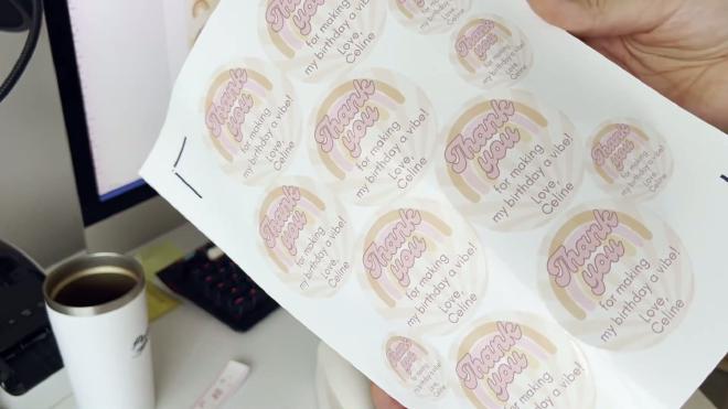 Round rainbow thank-you stickers that say thank you for making my birthday a vibe, love Celine